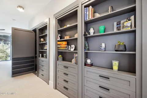 a bathroom with a shower and a sink