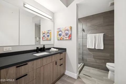 a view of a patio with table and chairs