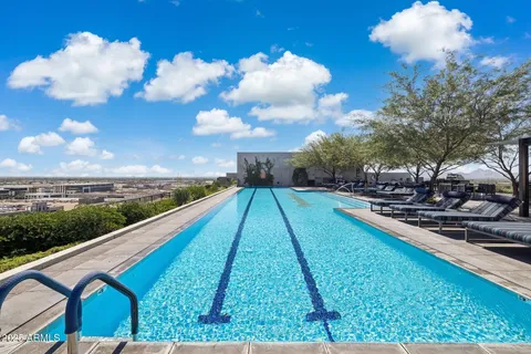 a room with furniture and a large window