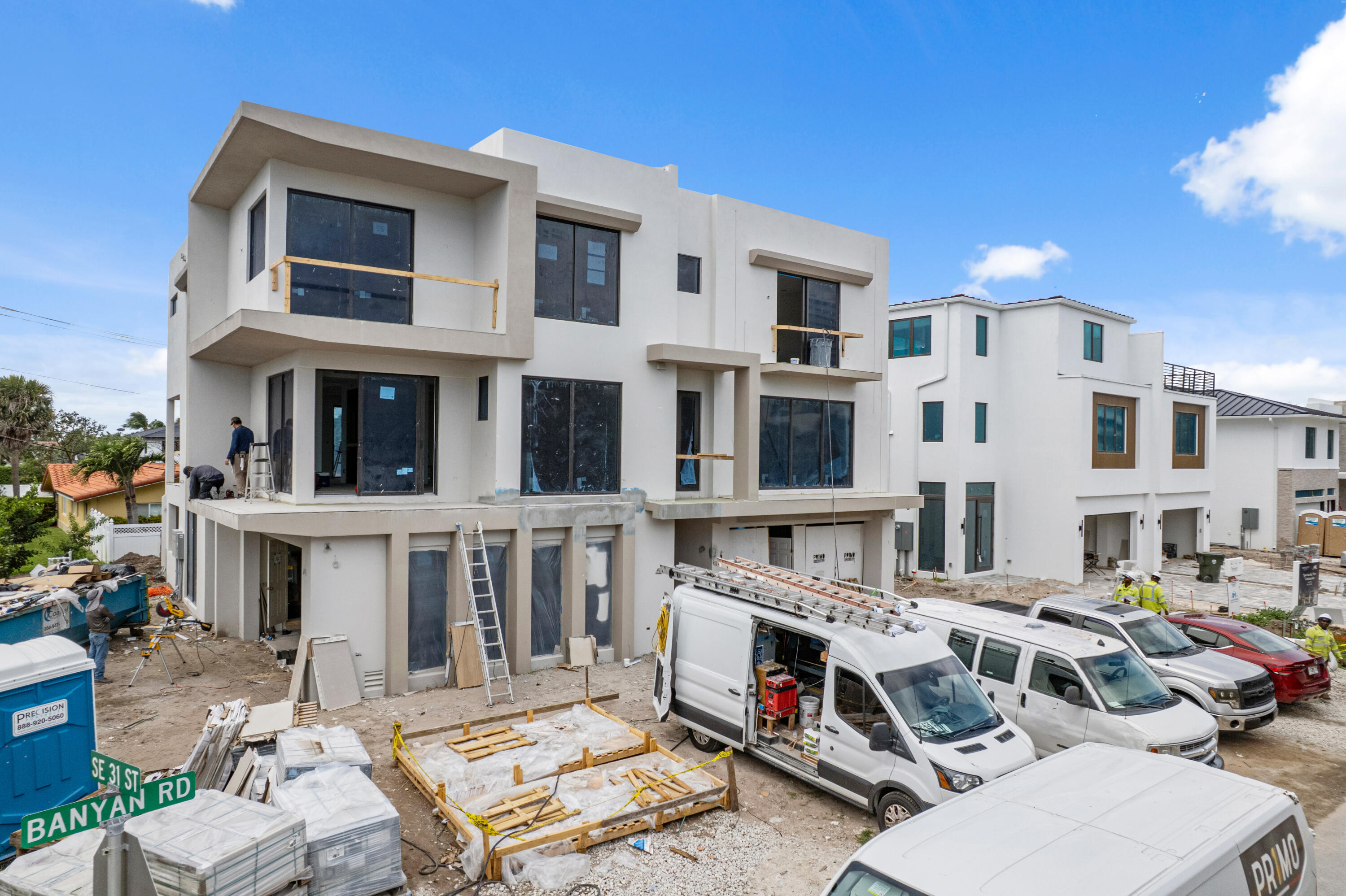 3099 Banyan Road, Unit 2 Boca Raton, FL 33432 - Photo 9 of 11 a view of a building with many windows