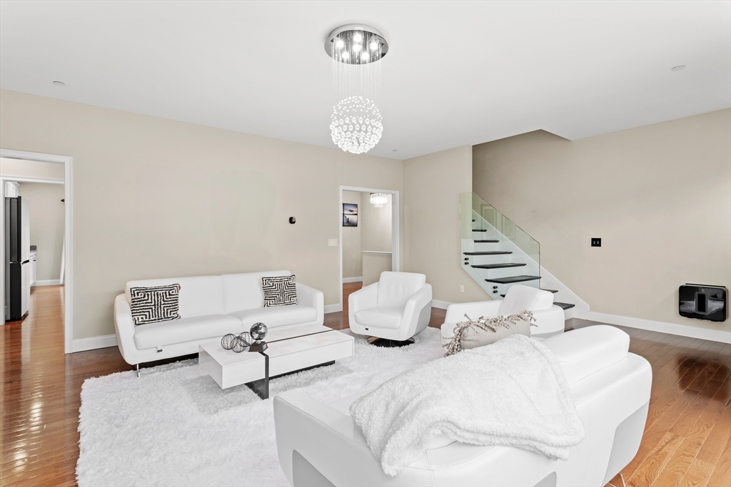 5D Manor Drive, Unit B Hooksett, NH 03106 - Photo 8 of 42 a bedroom with a bed and a large window