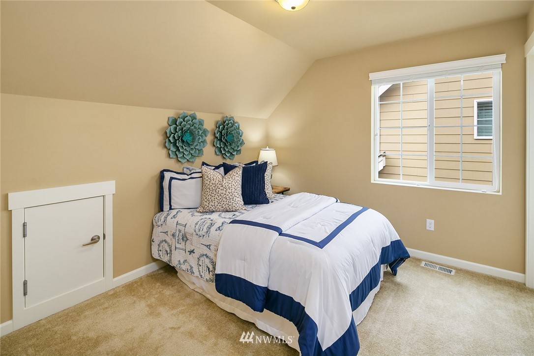 3807 219th Street Southeast Bothell, WA 98021 - Photo 14 of 23 a bedroom with a bed and a window