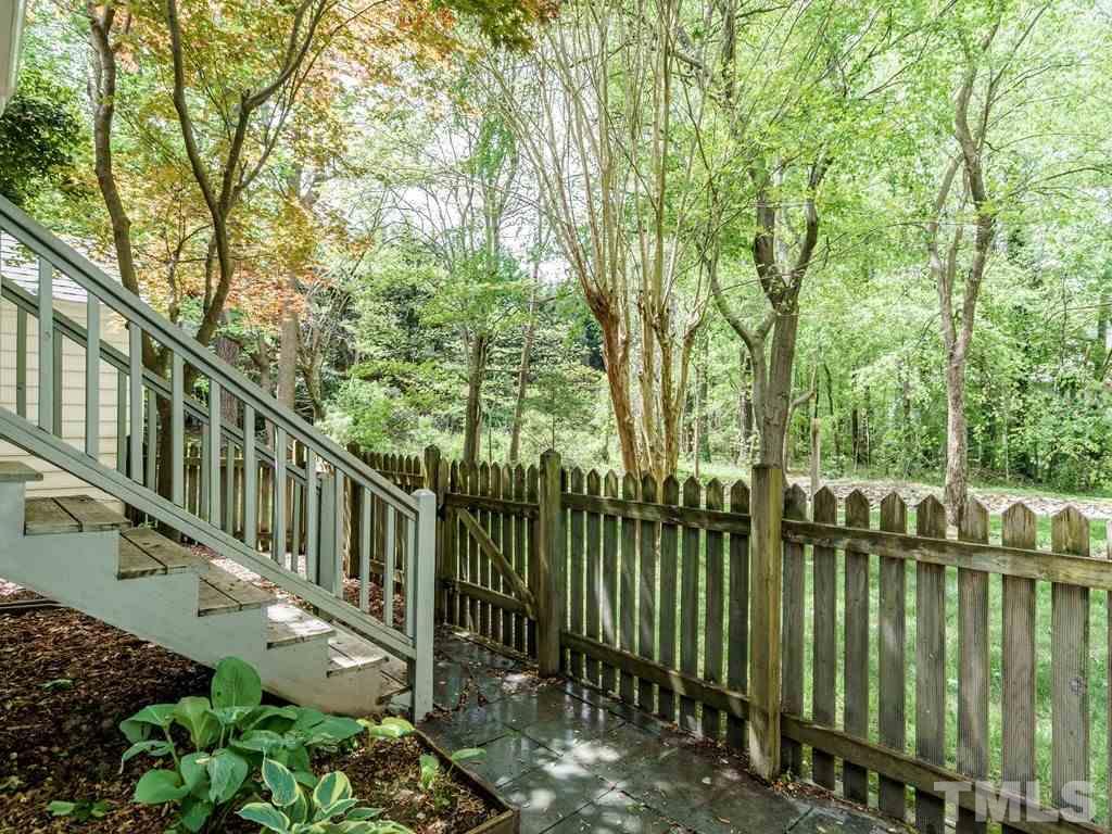 760 Weathergreen Drive Raleigh, NC 27615 - Photo 22 of 25 a view of pathway with a garden