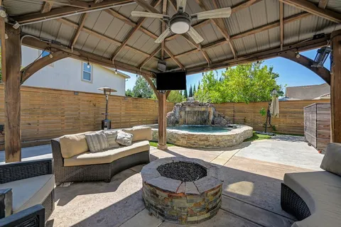 an aerial view of a house with outdoor space