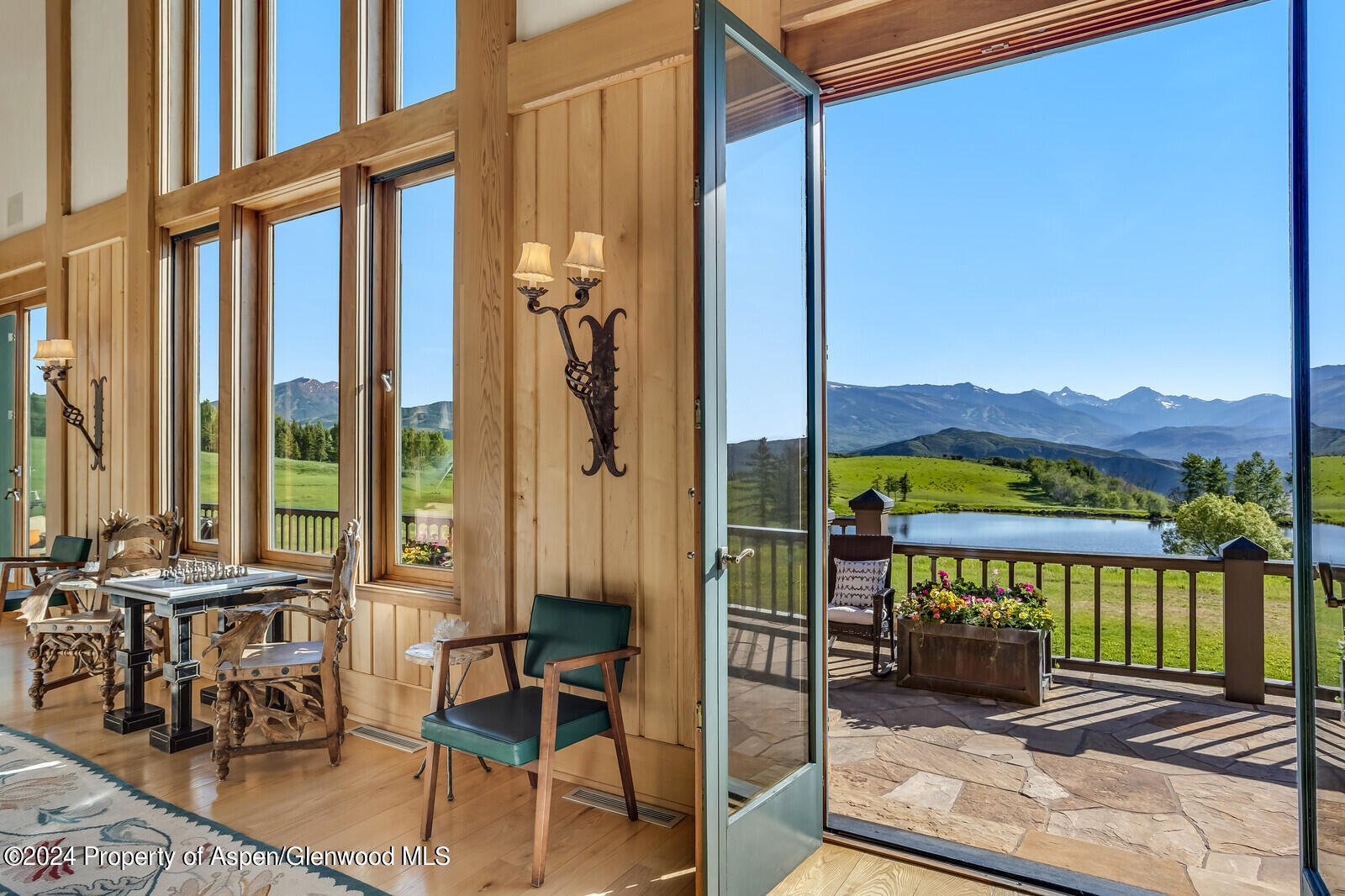 1200 Kessler Drive Aspen, CO 81612 - Photo 11 of 58 a view of a chairs and table in the patio