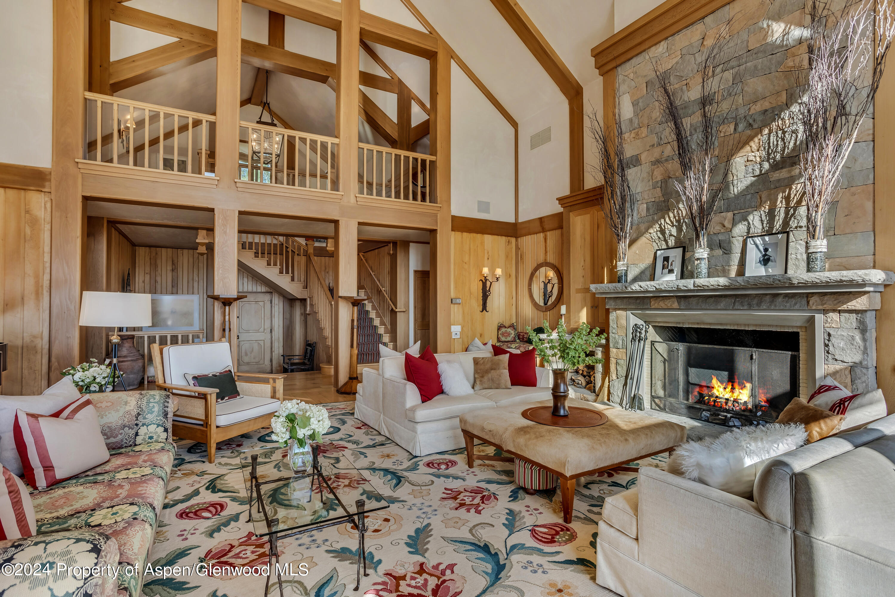 1200 Kessler Drive Aspen, CO 81612 - Photo 15 of 58 a view of a patio with couches table and chairs and potted plants