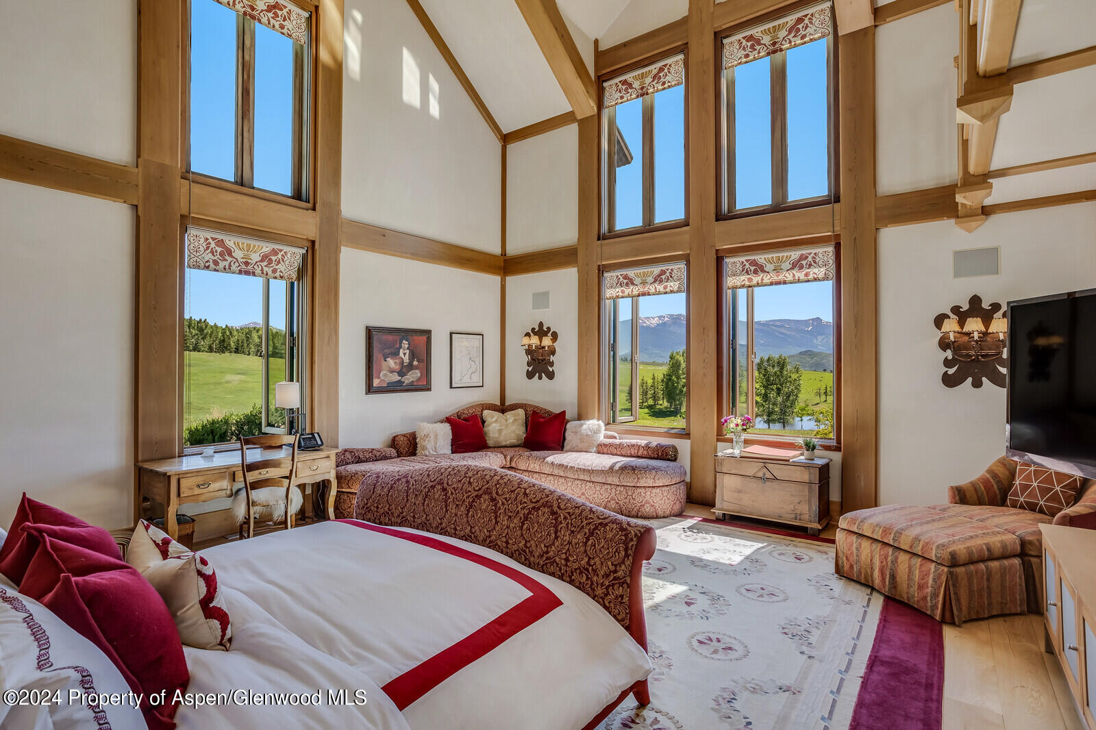 1200 Kessler Drive Aspen, CO 81612 - Photo 23 of 58 a living room with furniture fireplace and large windows