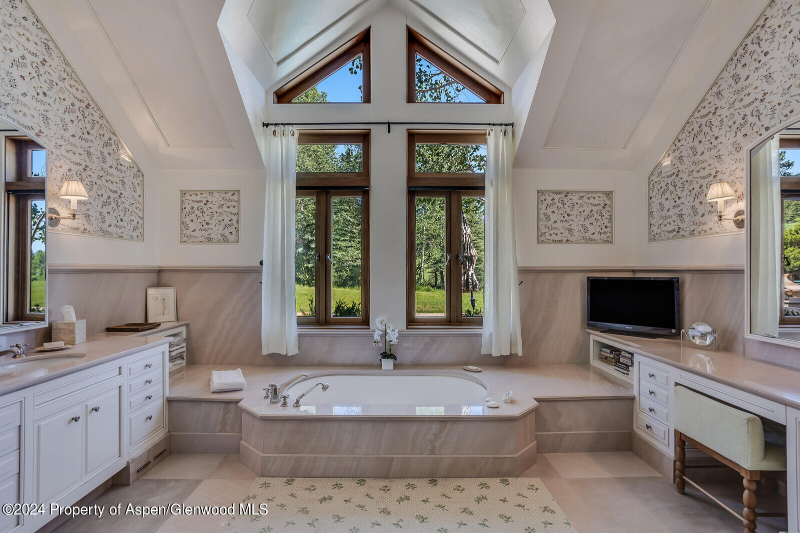 1200 Kessler Drive Aspen, CO 81612 - Photo 25 of 58 a living room with fireplace furniture and a flat screen tv