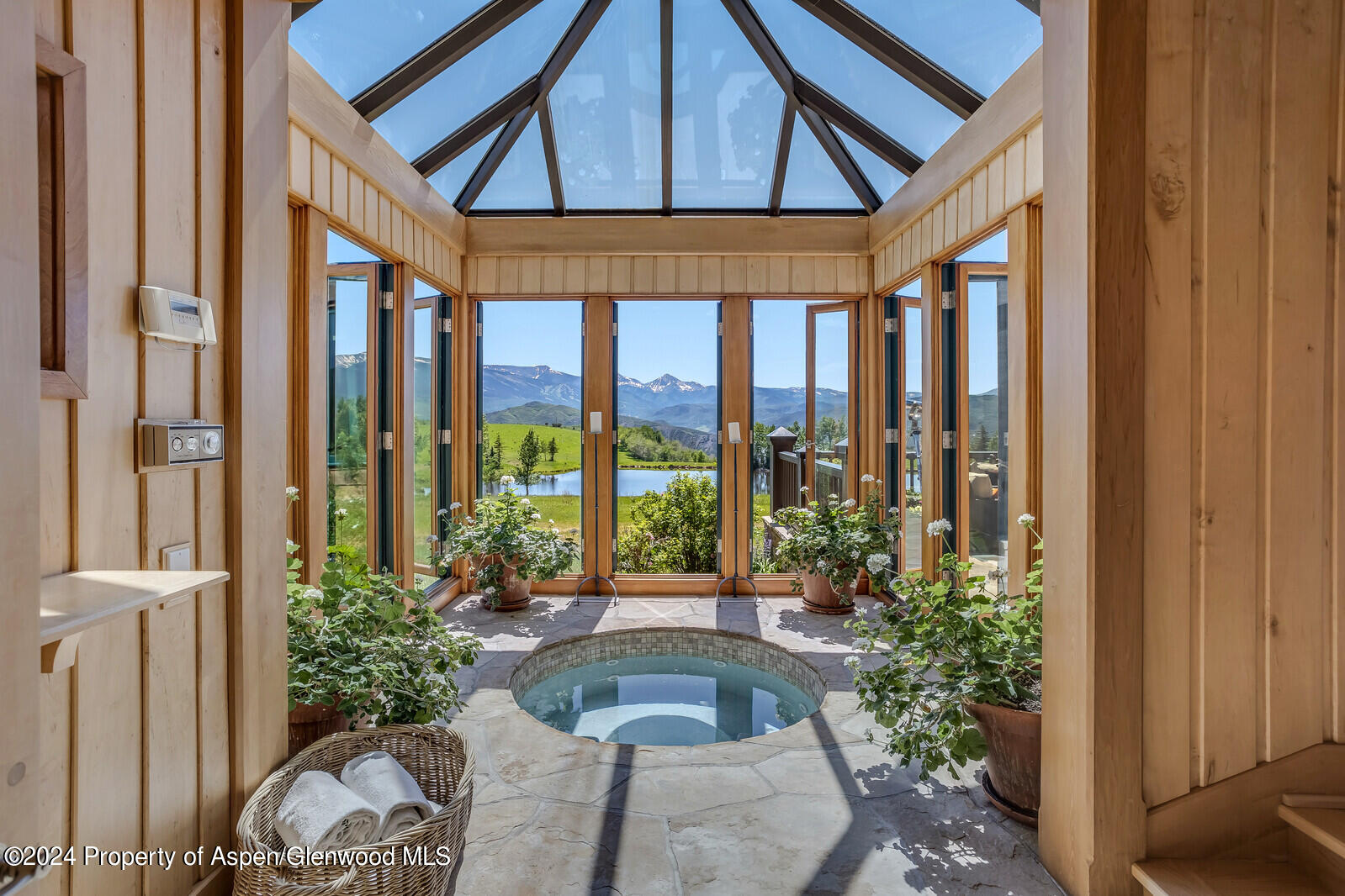 1200 Kessler Drive Aspen, CO 81612 - Photo 28 of 58 a front view of a house with garden