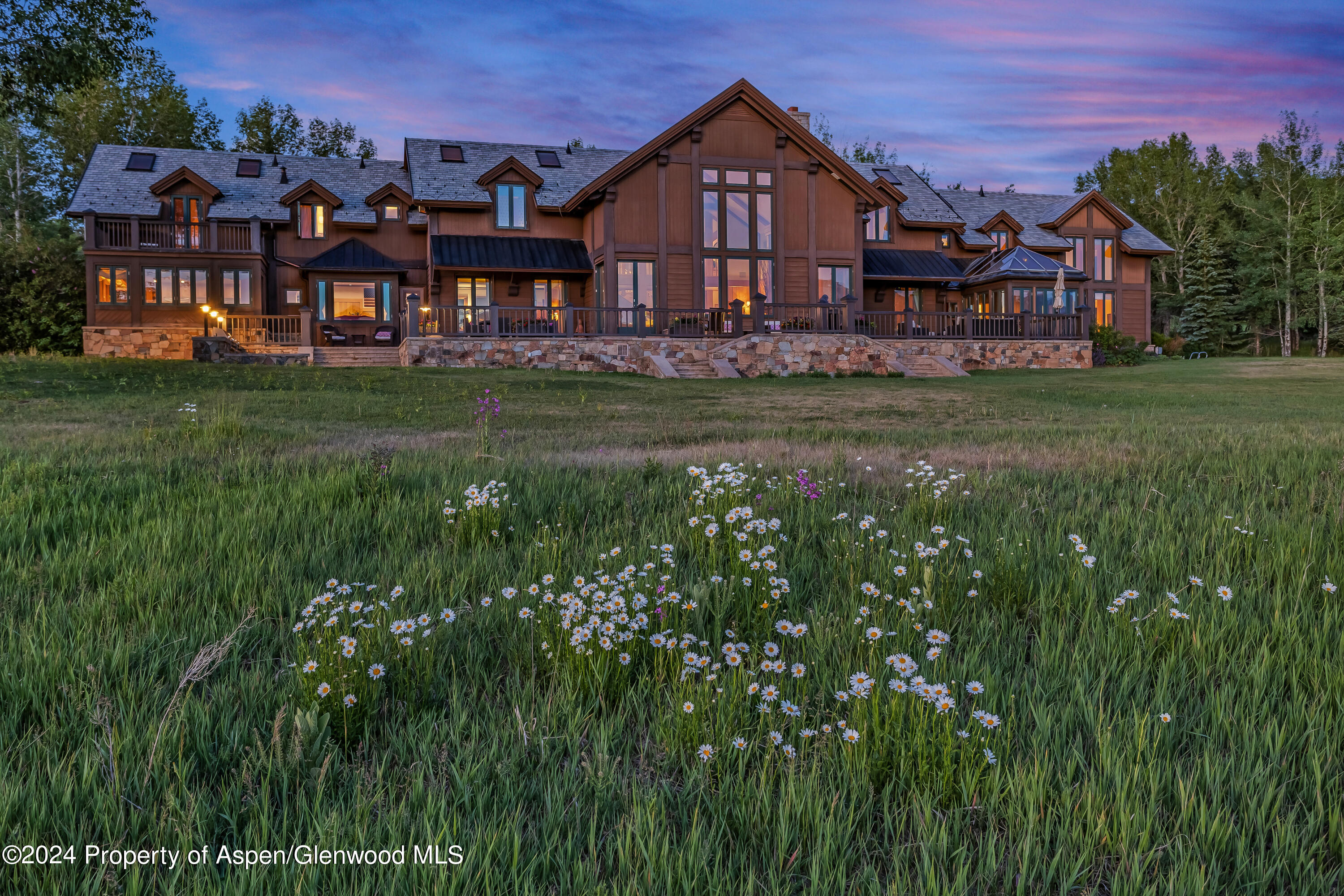 1200 Kessler Drive Aspen, CO 81612 - Photo 3 of 58 a front view of a house with garden