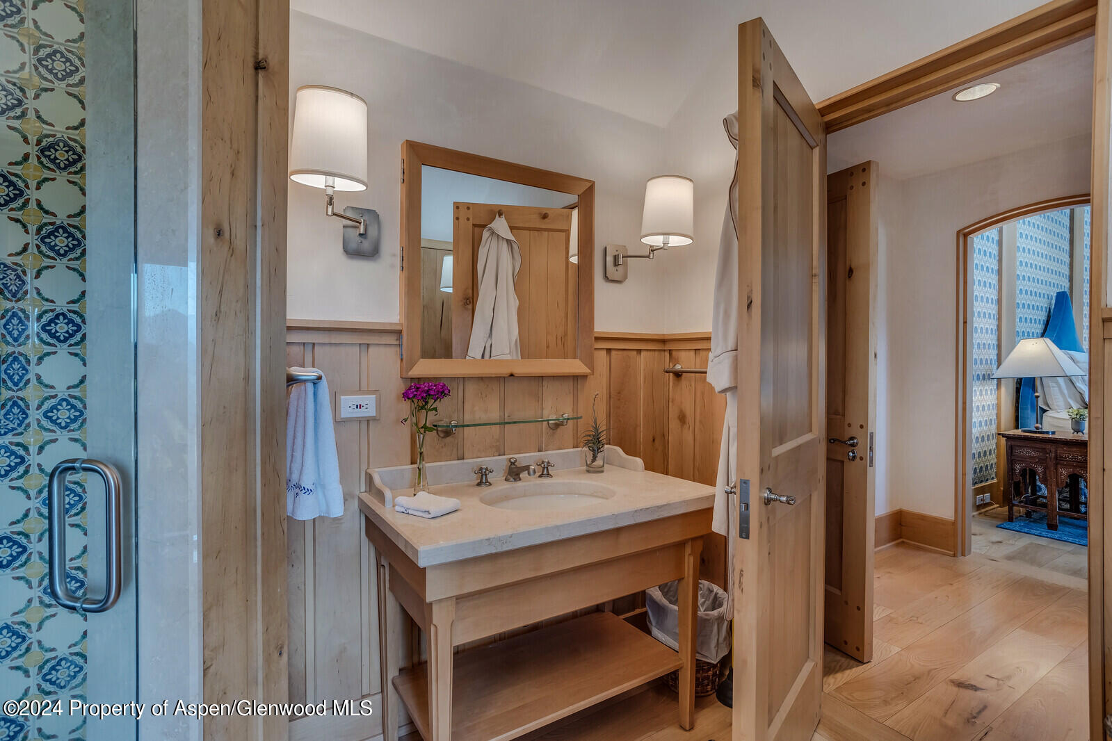 1200 Kessler Drive Aspen, CO 81612 - Photo 38 of 58 a bathroom with a sink vanity and a mirror