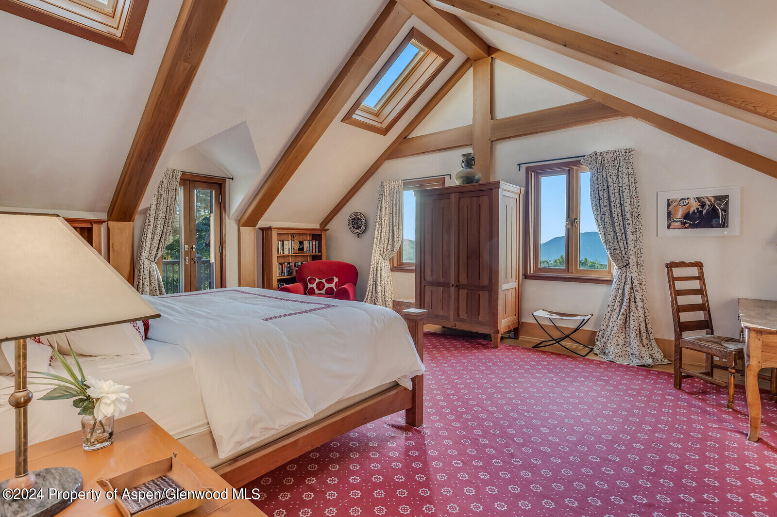 1200 Kessler Drive Aspen, CO 81612 - Photo 39 of 58 a bed room with a bed and a chair