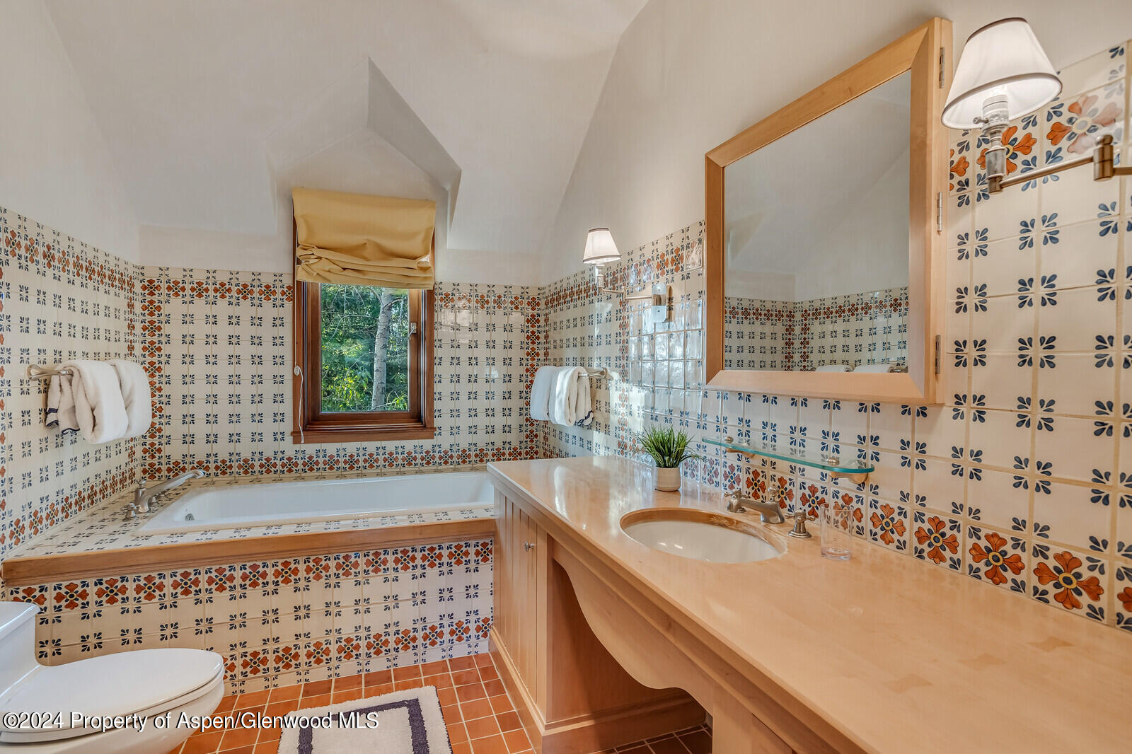 1200 Kessler Drive Aspen, CO 81612 - Photo 42 of 58 a bathroom with a granite countertop sink toilet and shower