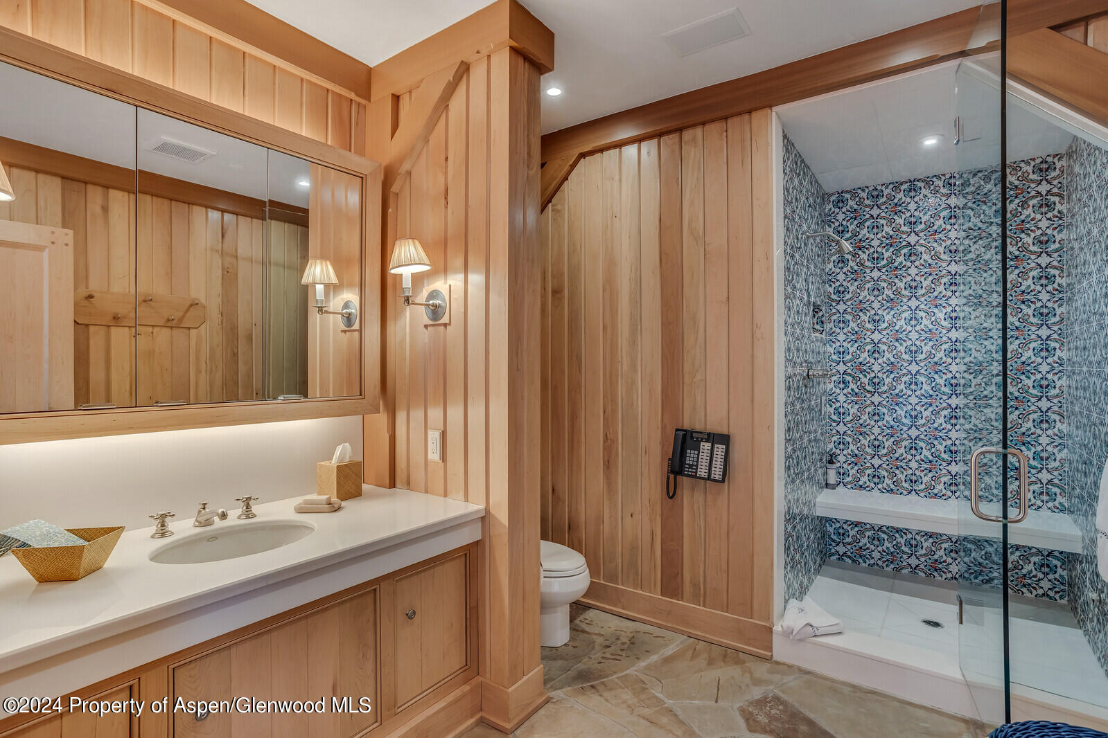 1200 Kessler Drive Aspen, CO 81612 - Photo 45 of 58 a bathroom with a granite countertop sink and a mirror