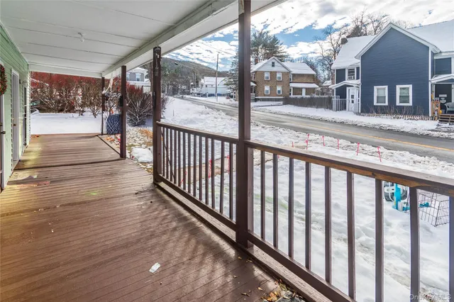 a view of a house with a porch