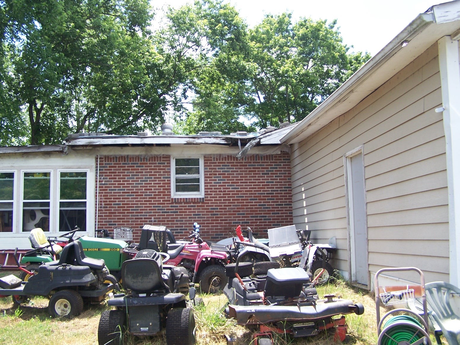 275 Chicken Creek Road Pulaski, TN 38478 - Photo 3 of 22 a backyard of a house with yard table and chairs