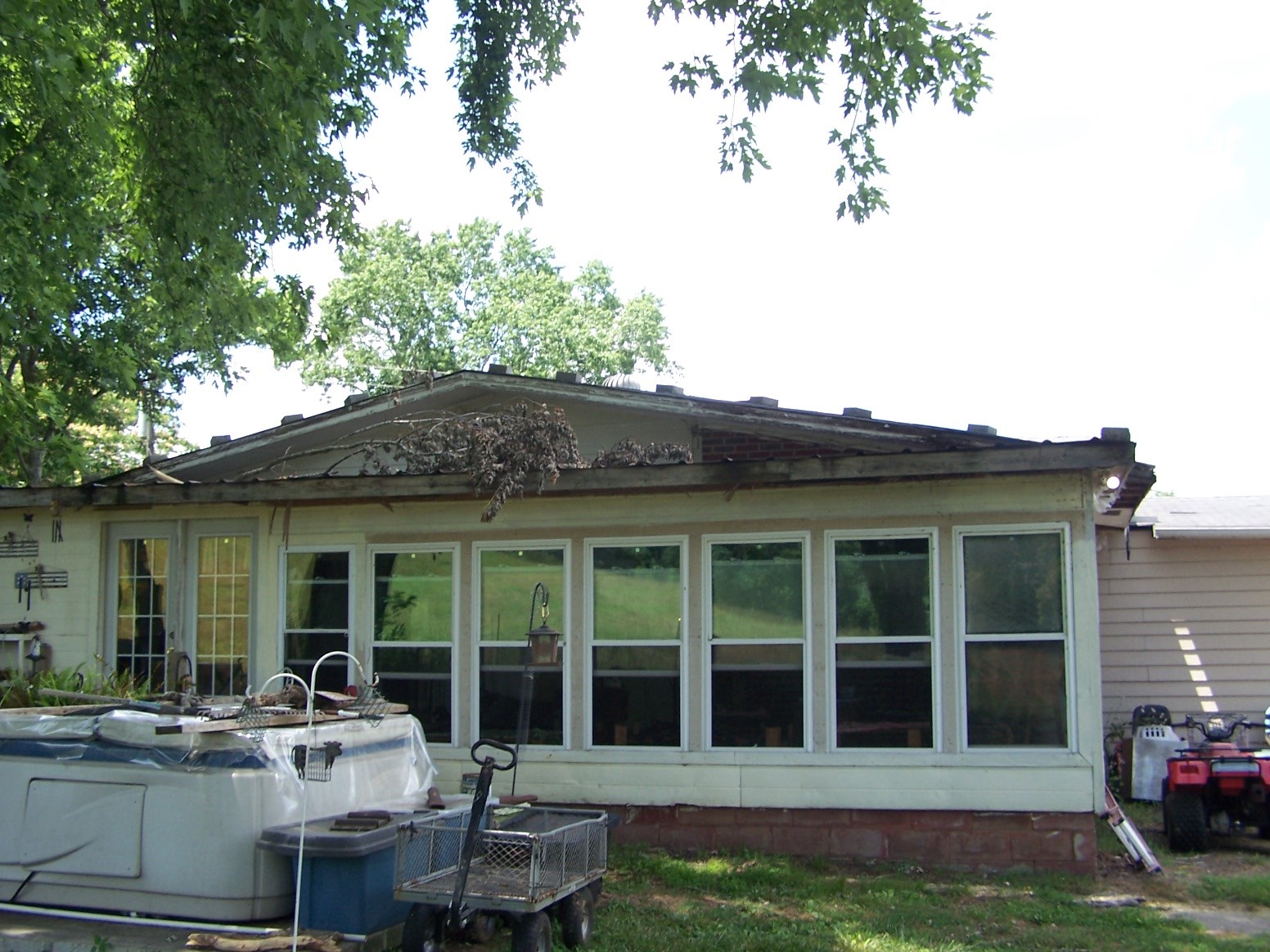 275 Chicken Creek Road Pulaski, TN 38478 - Photo 4 of 22 a house view with a sitting space and garden