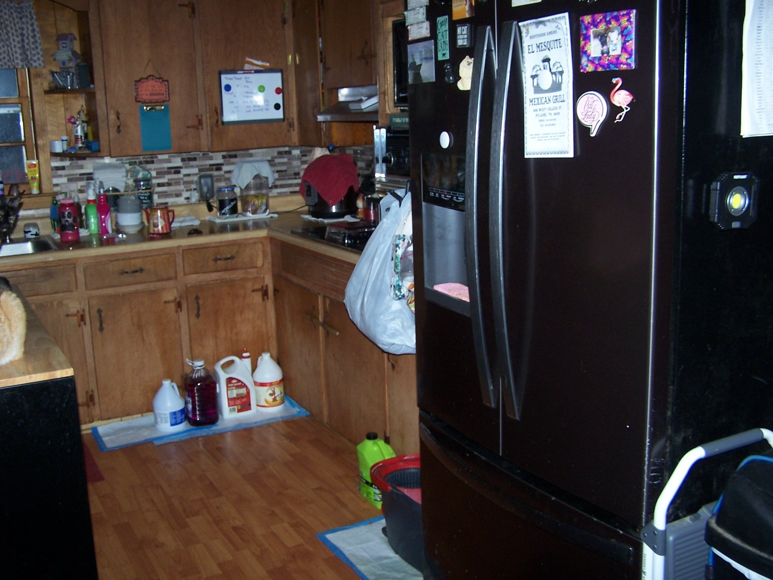 275 Chicken Creek Road Pulaski, TN 38478 - Photo 9 of 22 a kitchen with a refrigerator and a stove top oven