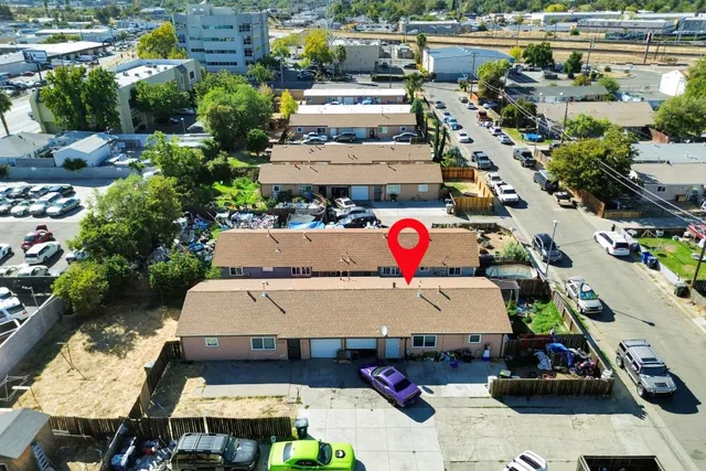 a view of yard with patio