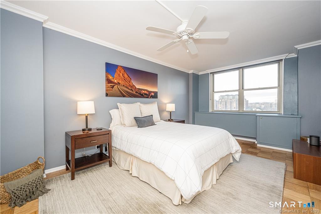 50 Glenbrook Road, Unit 6E Stamford, CT 06902 - Photo 13 of 18 a bedroom with a bed and a window