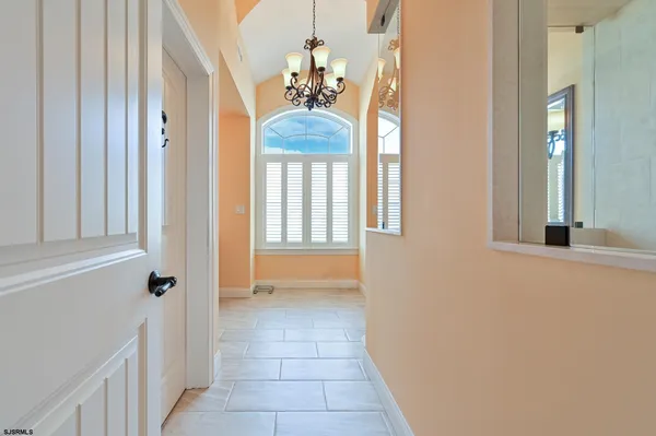 a living room with a couch and a fireplace