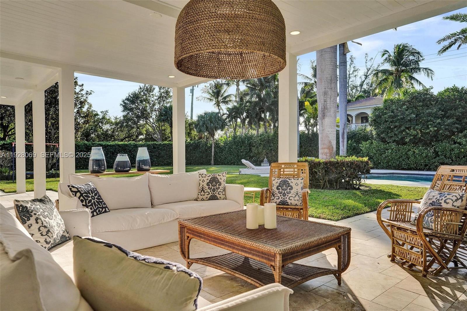 1281 Banyan Road Boca Raton, FL 33432 - Photo 22 of 69 a view of an outdoor dining space with a table and chairs