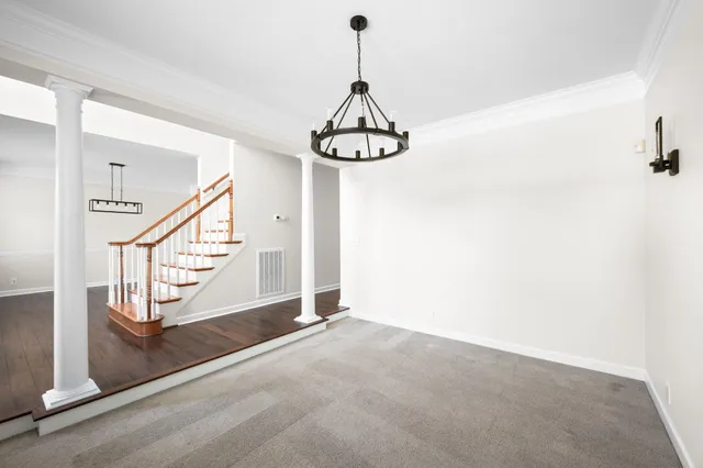 a kitchen with stainless steel appliances a sink stove and refrigerator