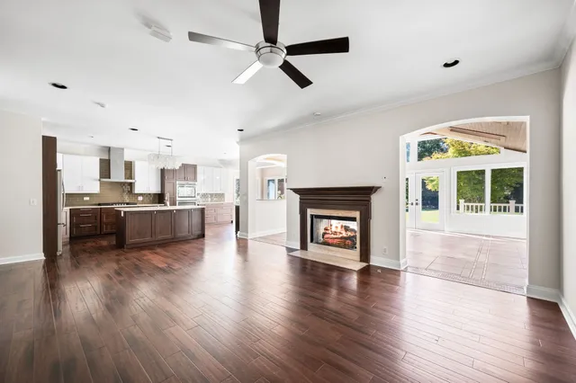 a kitchen with stainless steel appliances a stove a sink a refrigerator and cabinets