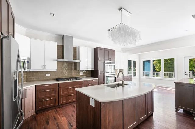 a bathroom with a sink and mirror