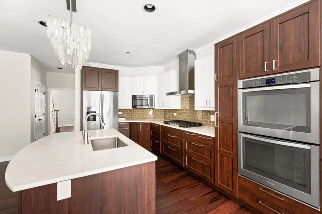 a bathroom with a bathtub and a sink