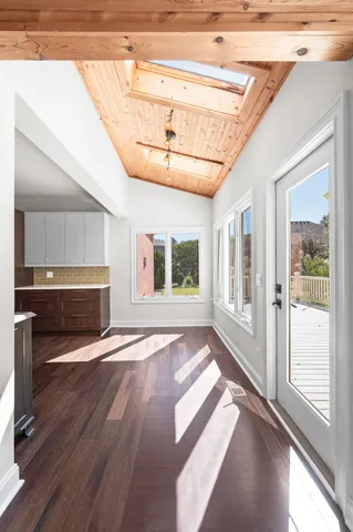 a view of a big room with carpet