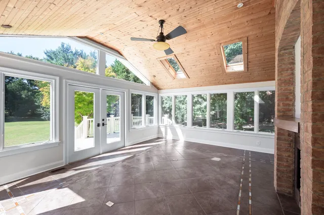 a view of a hallway with staircase