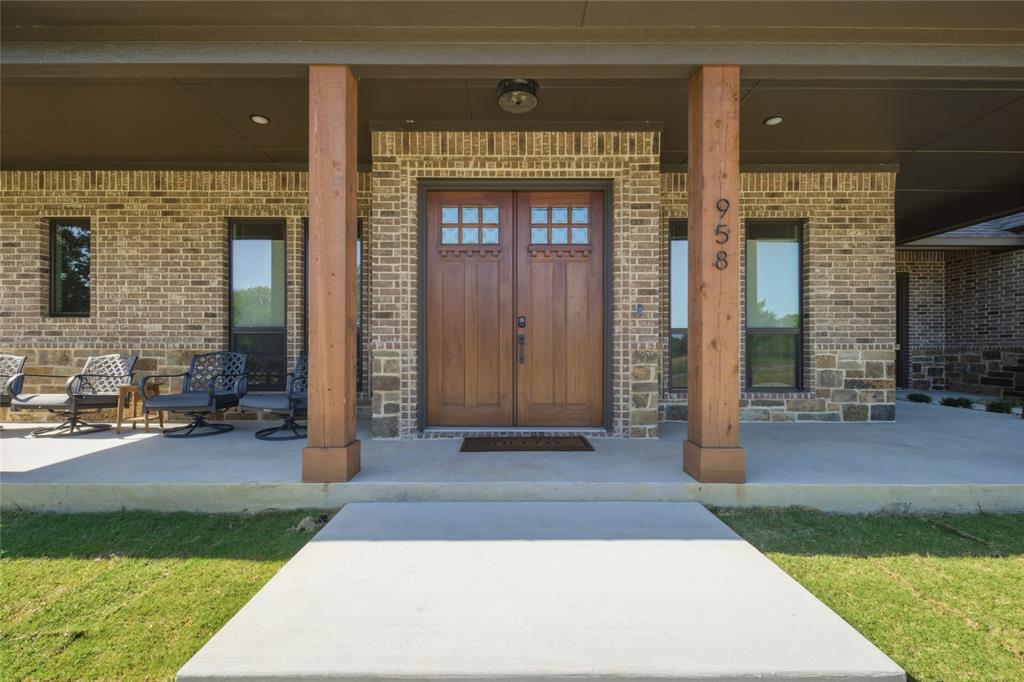 958 Cedar Mills Road Gordonville, TX 76245 - Photo 3 of 40 a front view of a house with yard