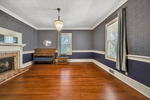 a spacious bathroom with a double vanity sink a mirror and a shower