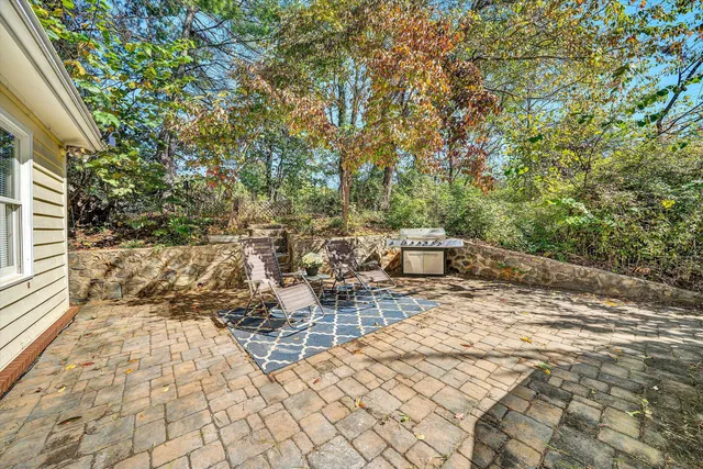 a view of a livingroom with furniture and wooden floor