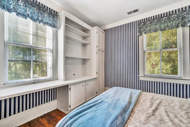 a bathroom with a shower curtain sink and a toilet