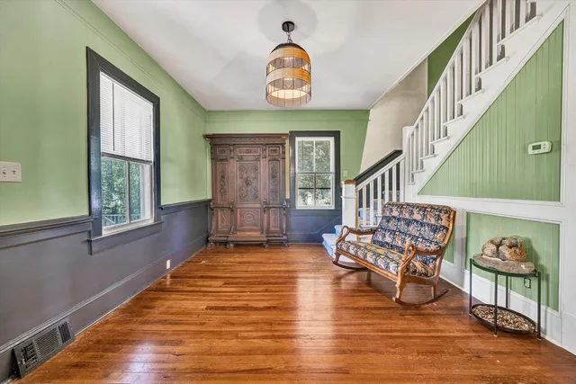 a view of entryway with wooden floor