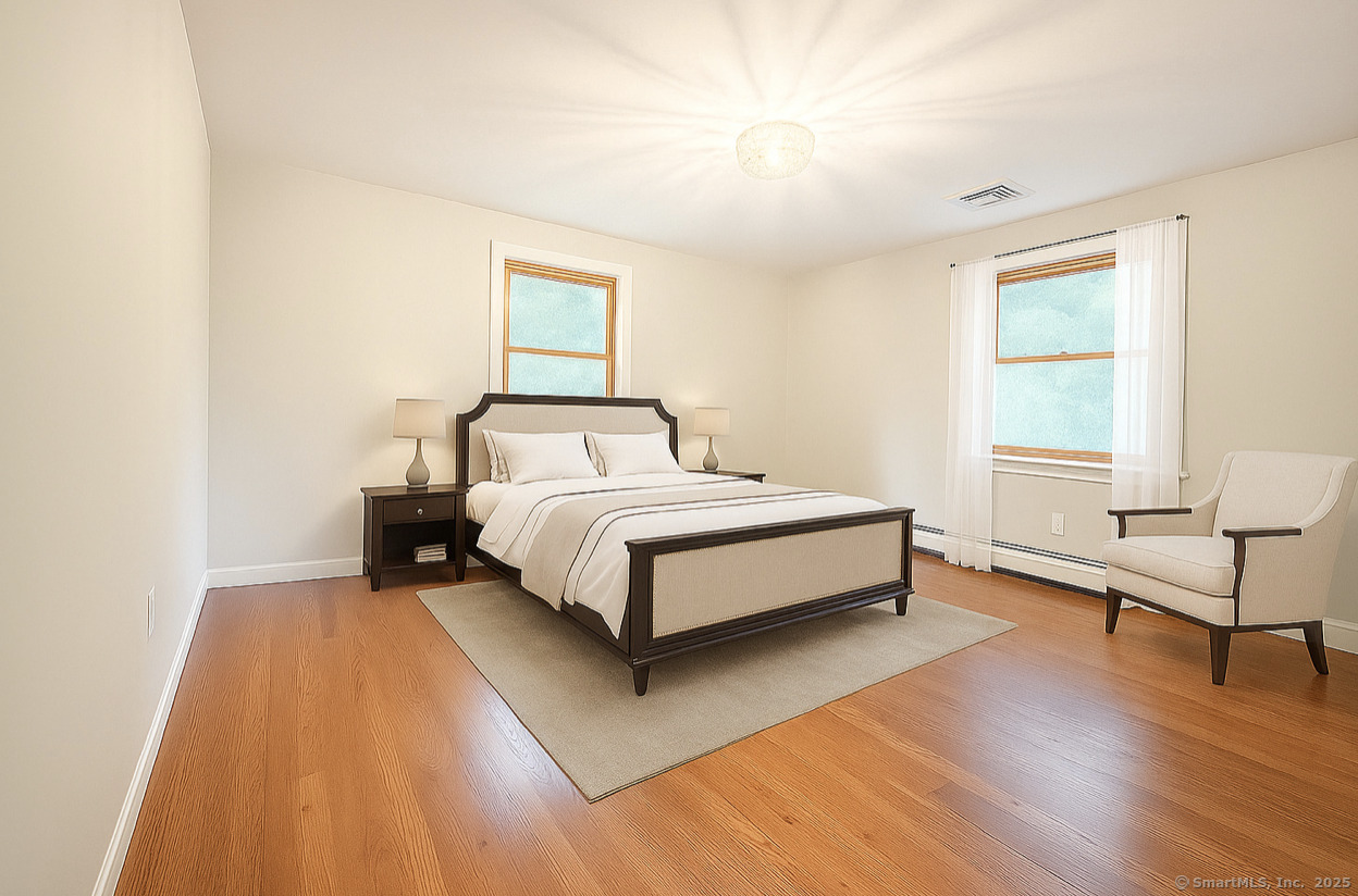 11 Pond Circle Road Westbrook, CT 06498 - Photo 11 of 22 a bedroom with a bed and window