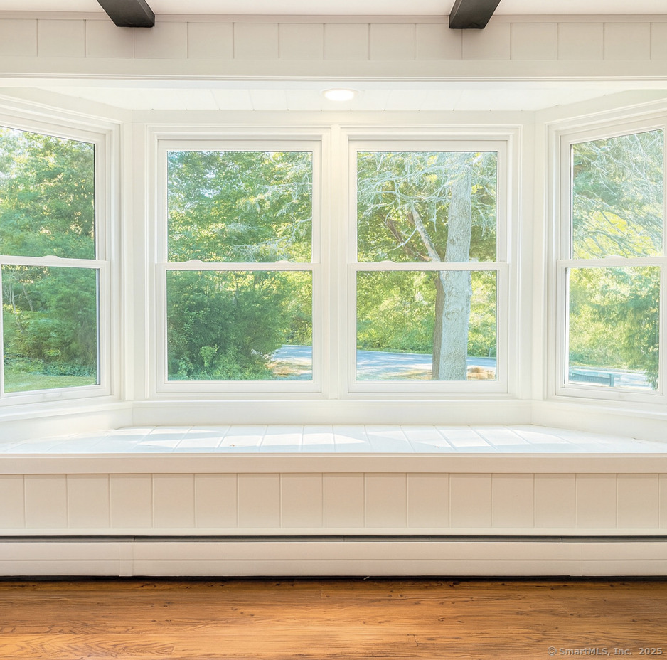 11 Pond Circle Road Westbrook, CT 06498 - Photo 9 of 22 a bathroom with a bathtub and next to a window
