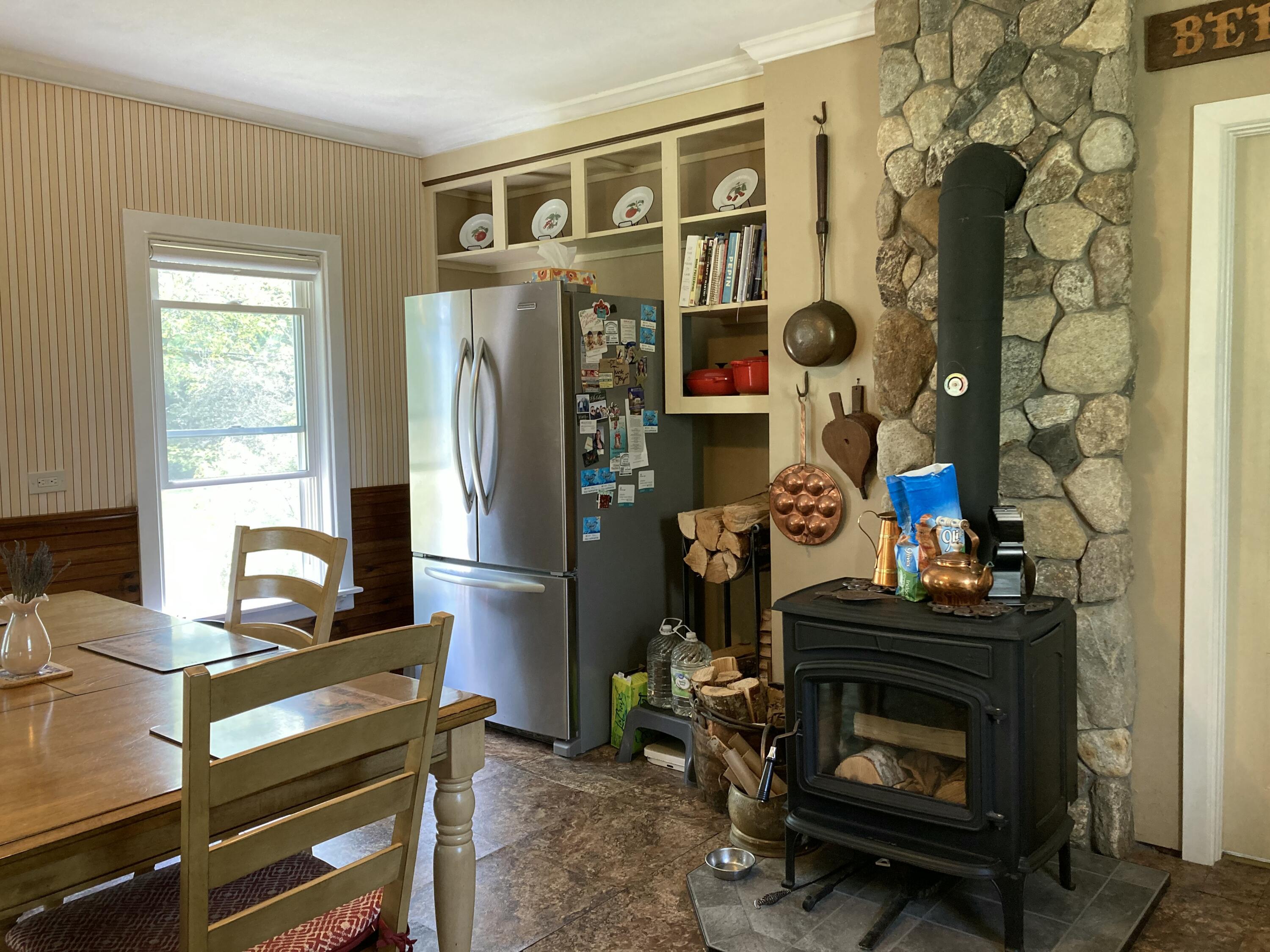 462 Kansas Road Milbridge, ME 04658 - Photo 8 of 63 Kitchen woodstove.