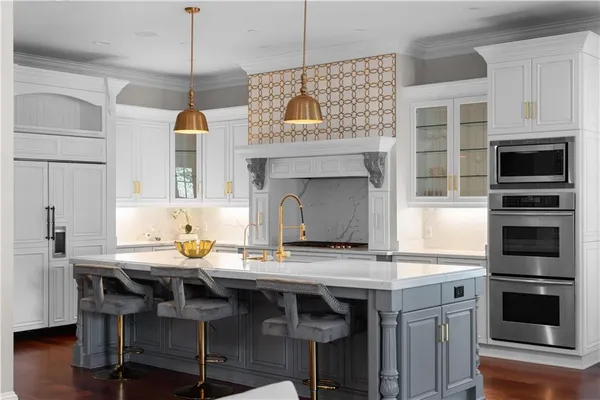 a living room with fireplace furniture and a flat screen tv