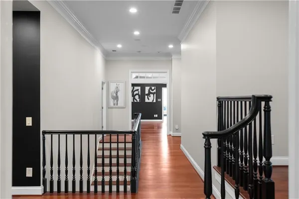 a living room with patio furniture and garden view