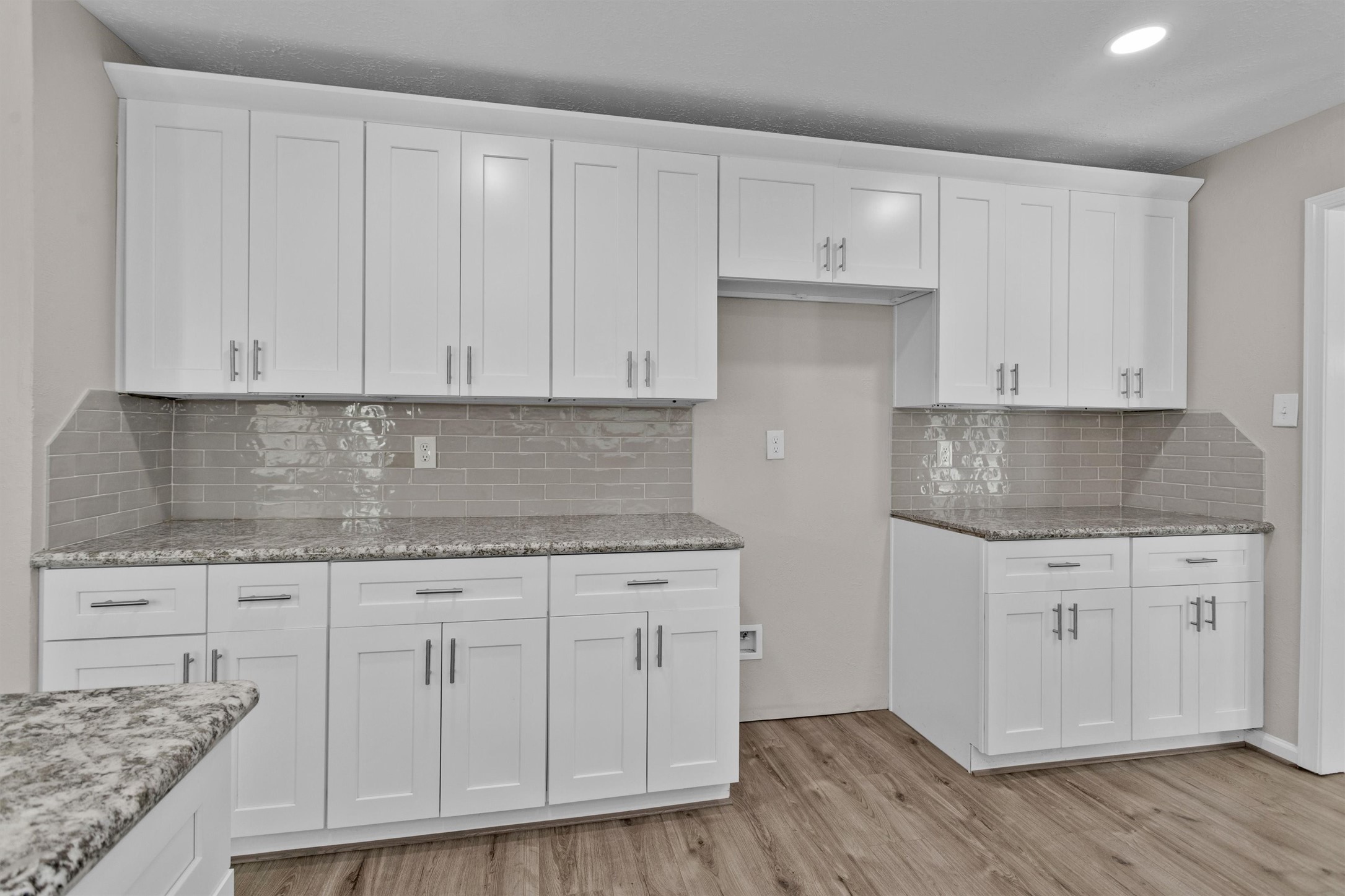 9115 Godstone Lane Spring, TX 77379 - Photo 15 of 46 The layout offers ample storage and workspace, complemented by recessed lighting.