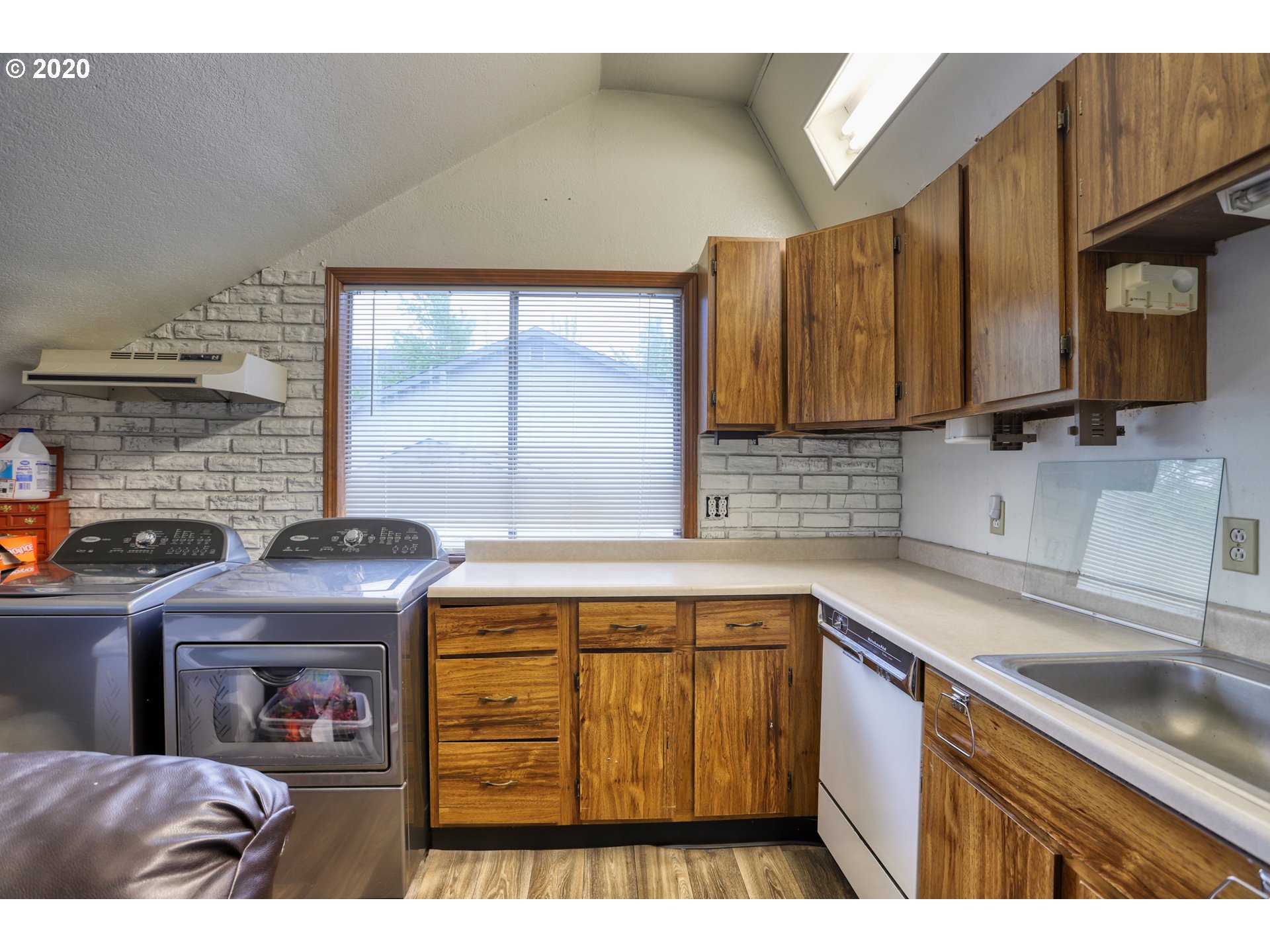 356 71st Street Springfield, OR 97478 - Photo 18 of 32 a kitchen with a sink cabinets and a window