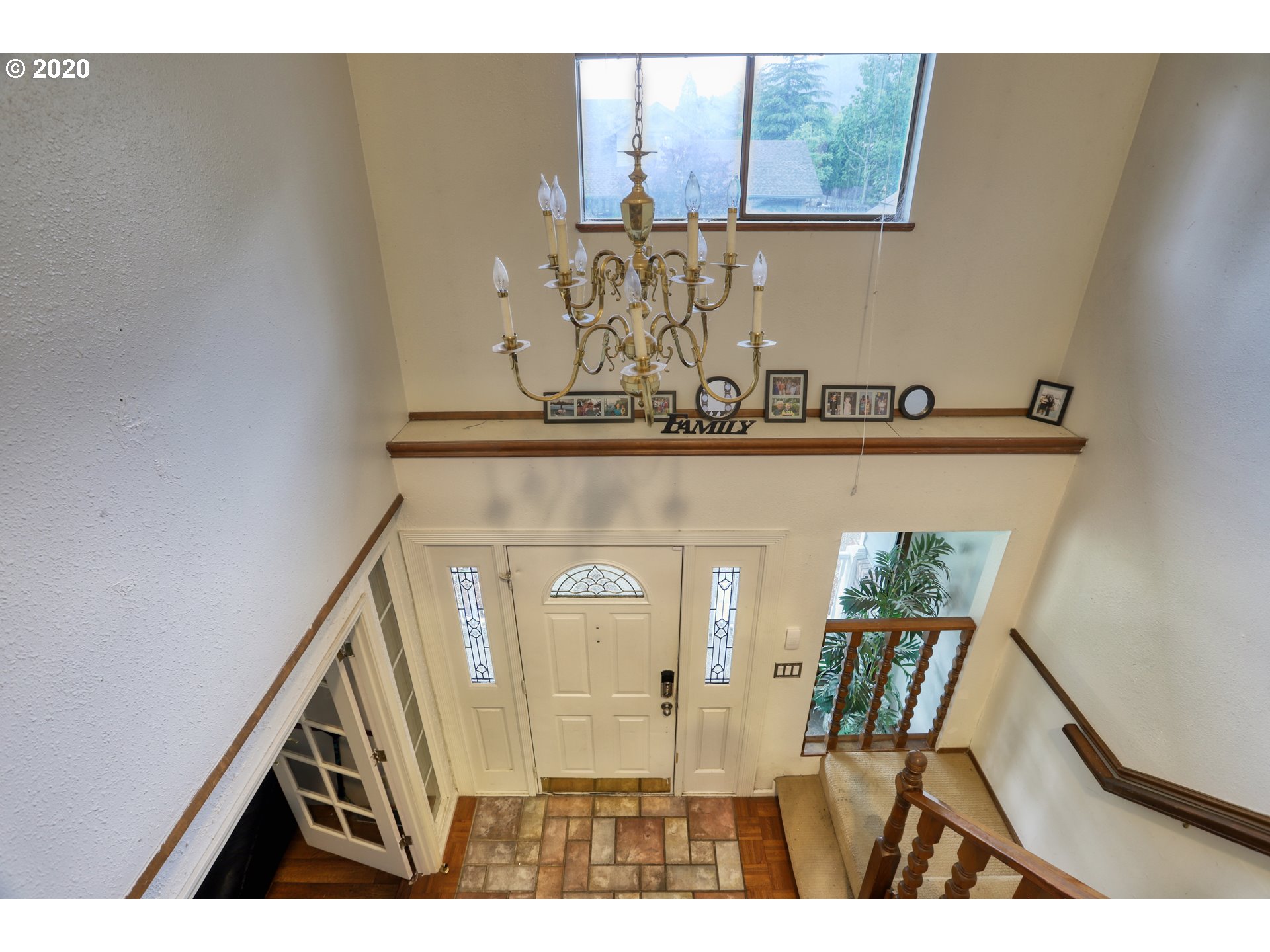 356 71st Street Springfield, OR 97478 - Photo 4 of 32 a view of a hallway with wooden floor and dining room