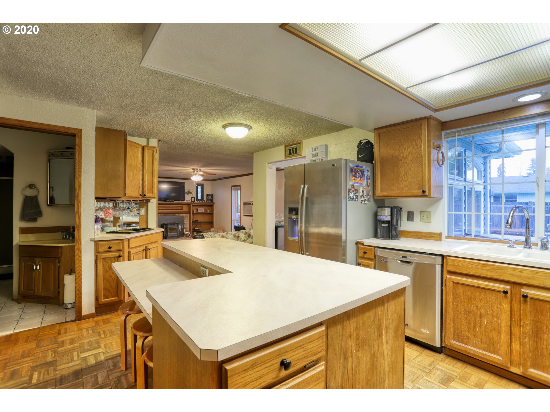 356 71st Street Springfield, OR 97478 - Photo 9 of 32 a kitchen with refrigerator and cabinets