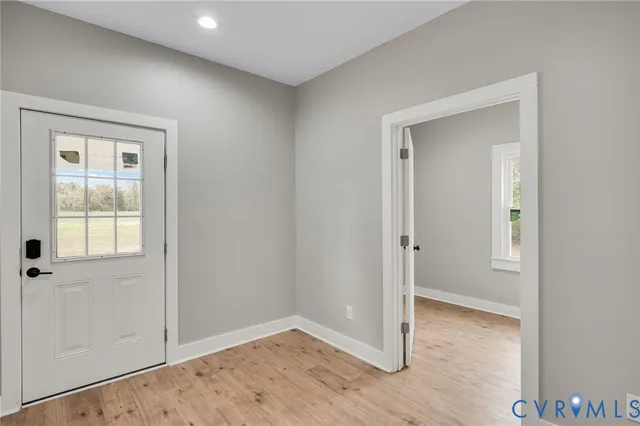 a bedroom with bed and window