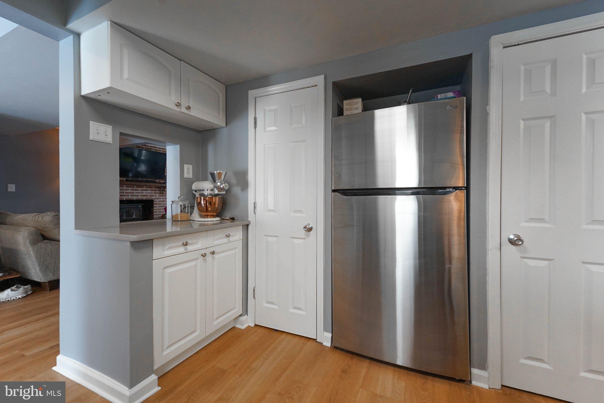 211 Queen Anne Road Stevensville, MD 21666 - Photo 13 of 33 Modern kitchen nook with sleek finishes.