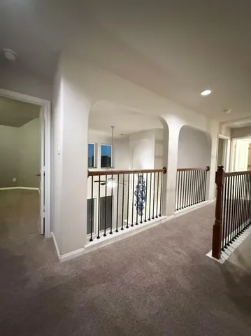 a bathroom with a toilet and a vanity