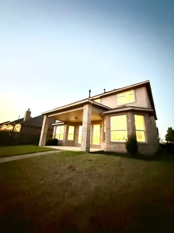 a view of a big yard with potted plants